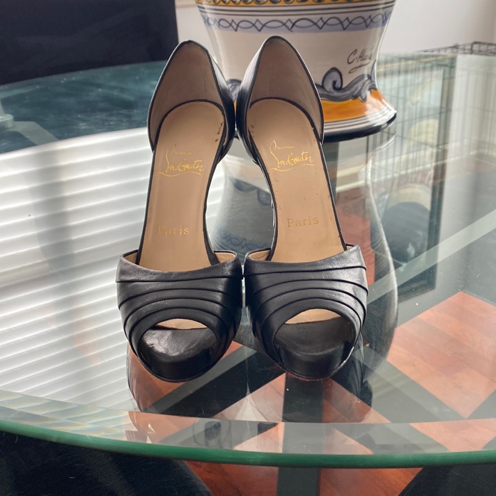 Christian Louboutin open toe pump. Excellent condition.